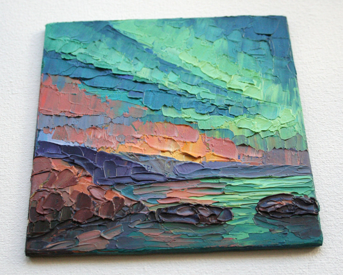 Close-up of impasto texture on Aurora Borealis mini oil painting, bold palette knife strokes