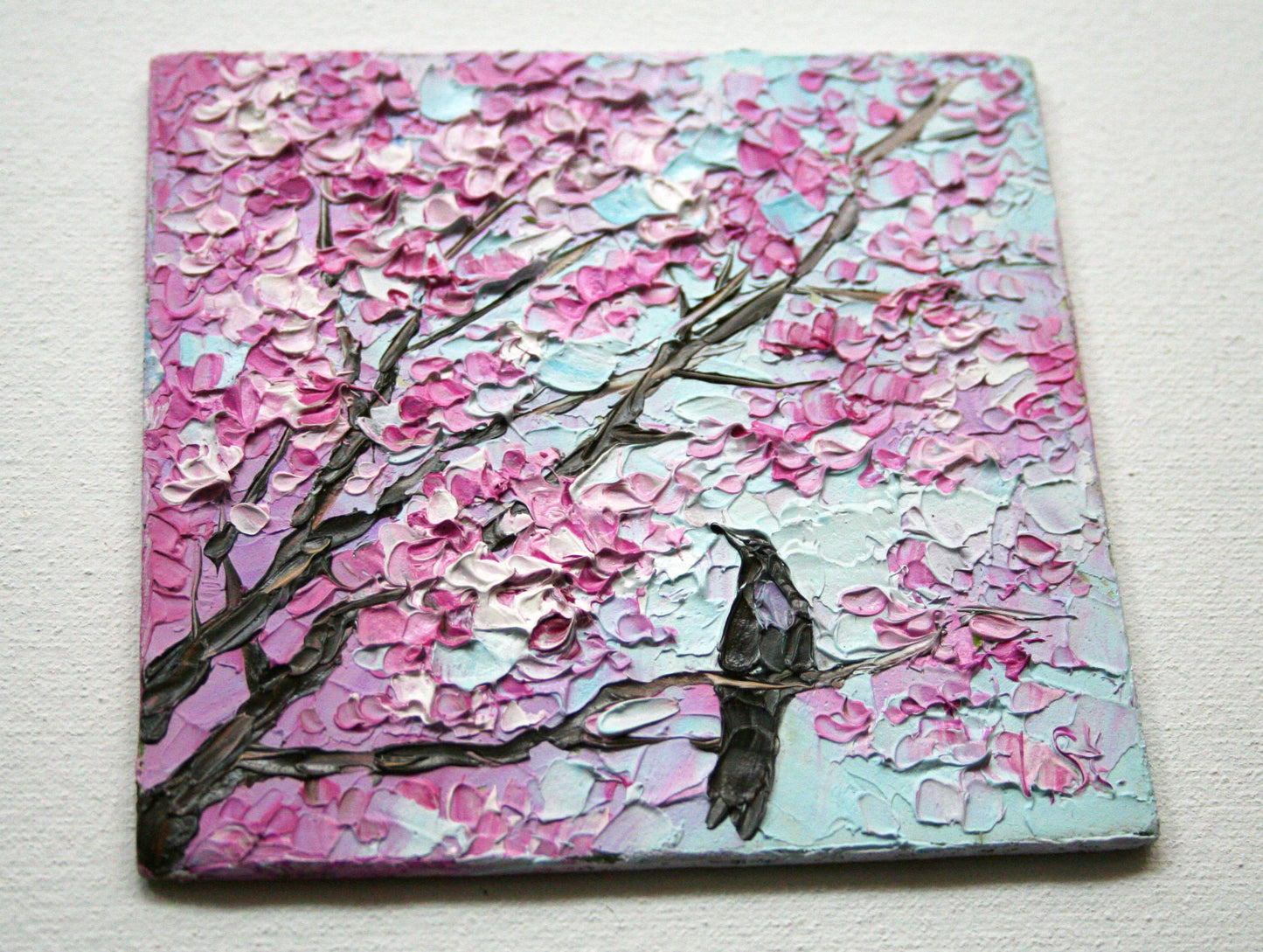 Close-up of palette knife texture on 4x4 inch cherry blossom and bird artwork