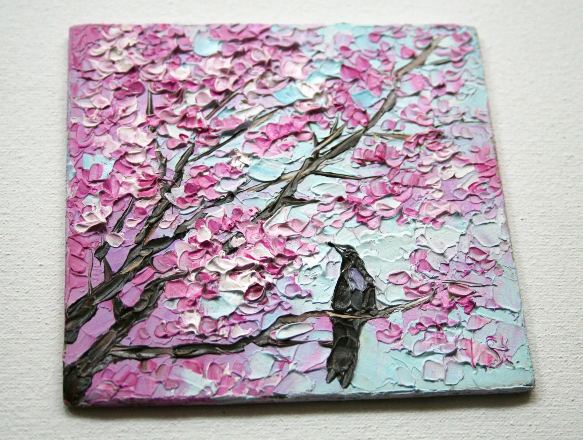 Close-up of palette knife texture on 4x4 inch cherry blossom and bird artwork
