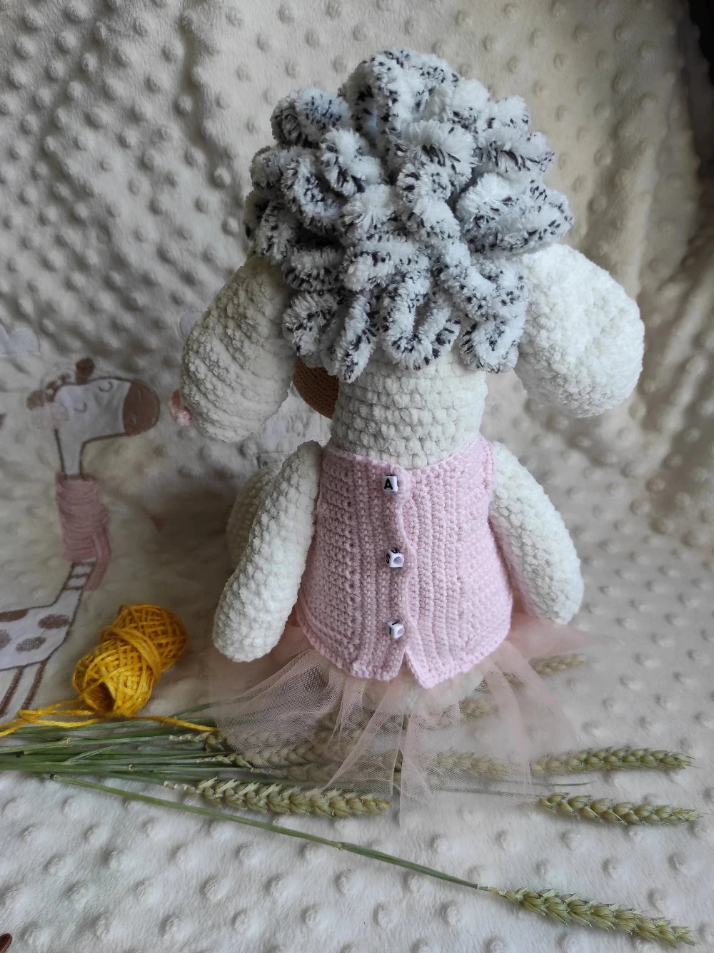Crochet sheep stuffed animal back view – pink organza dress with buttons, curly woolly head, handmade lamb toy 37cm