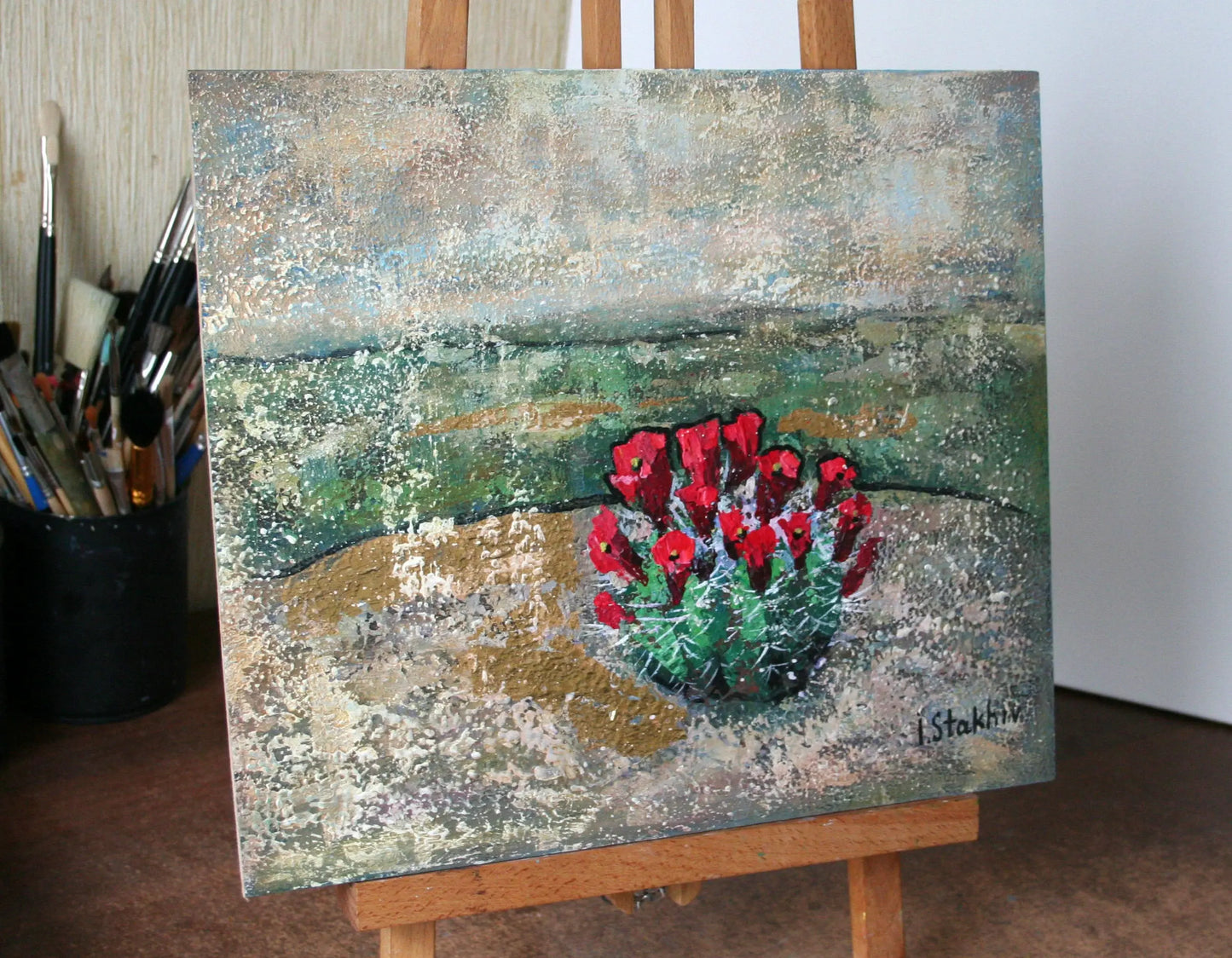 Desert painting detail — impasto palette knife texture, gold leaf, blooming cactus