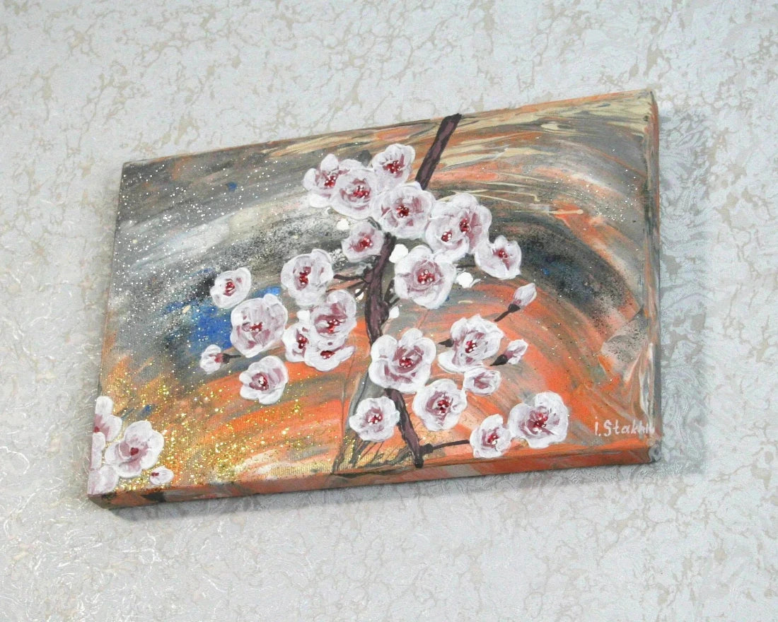 Fluid art cherry blossom, warm golden orange background, original artwork