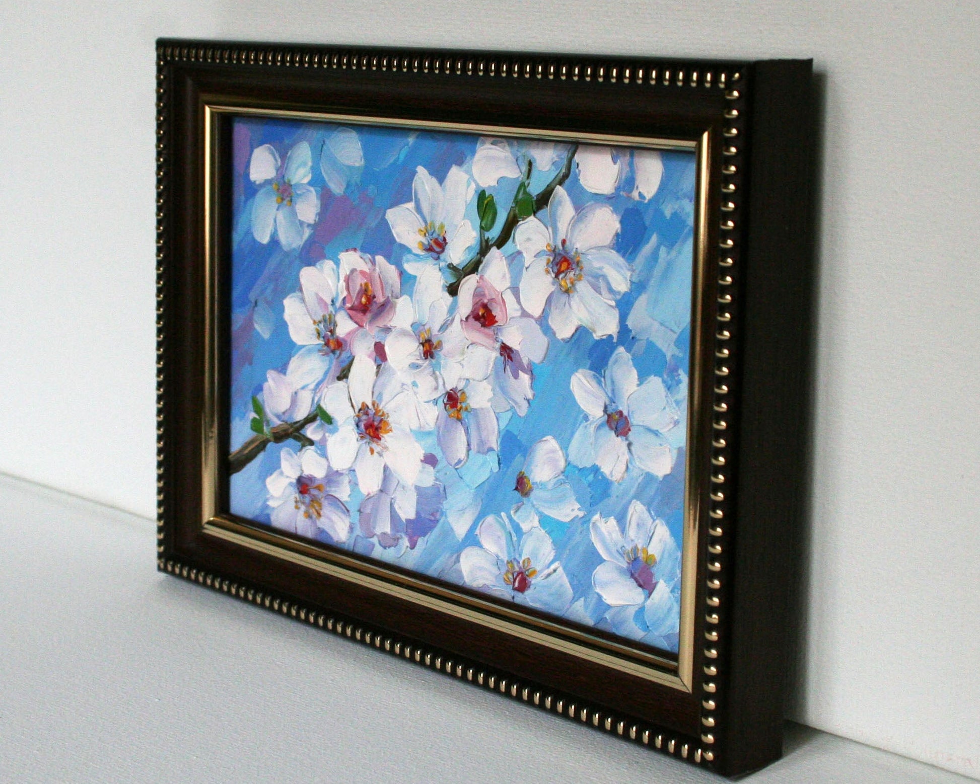 Framed oil painting of cherry blossoms 
