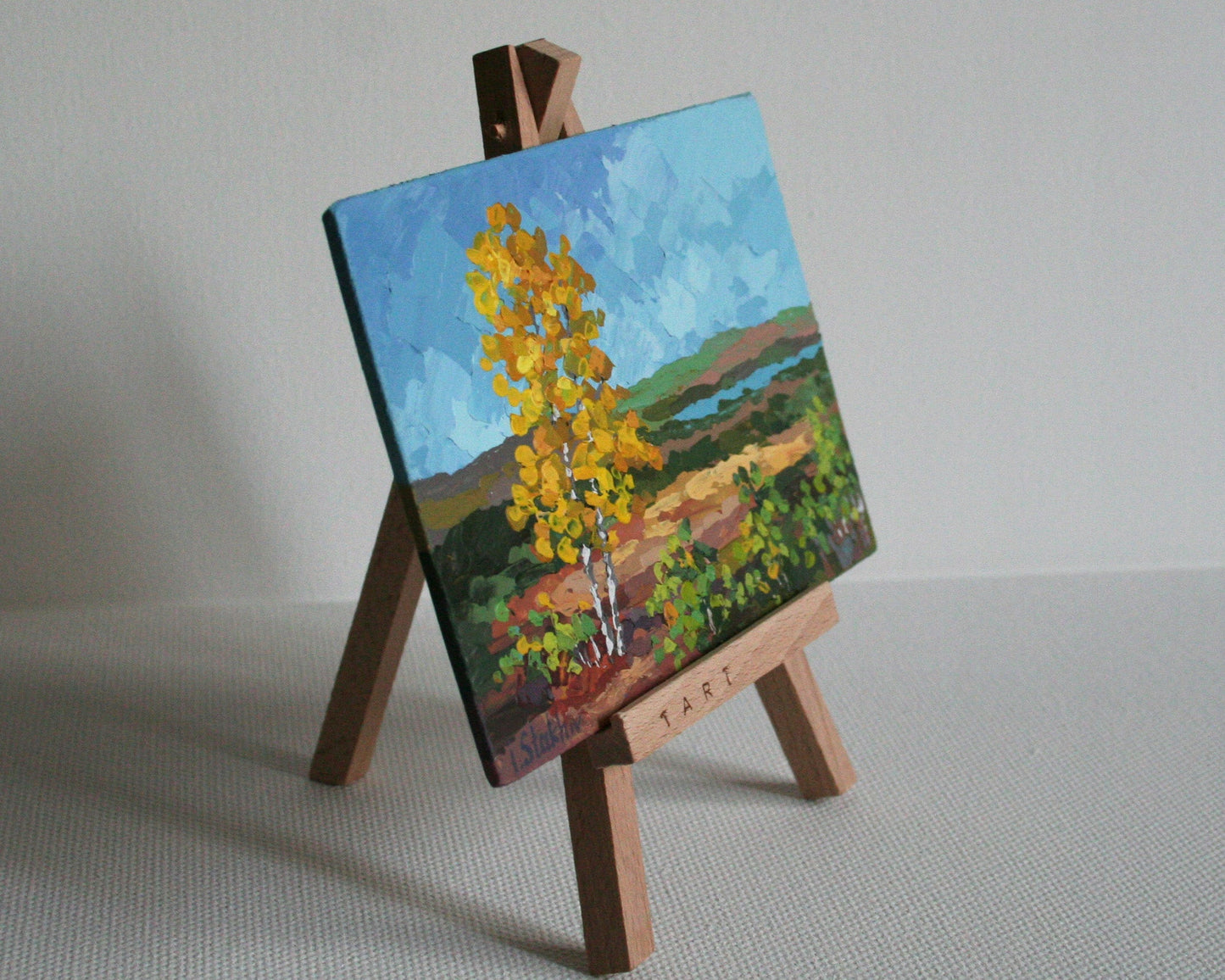 Miniature landscape painting on a small easel