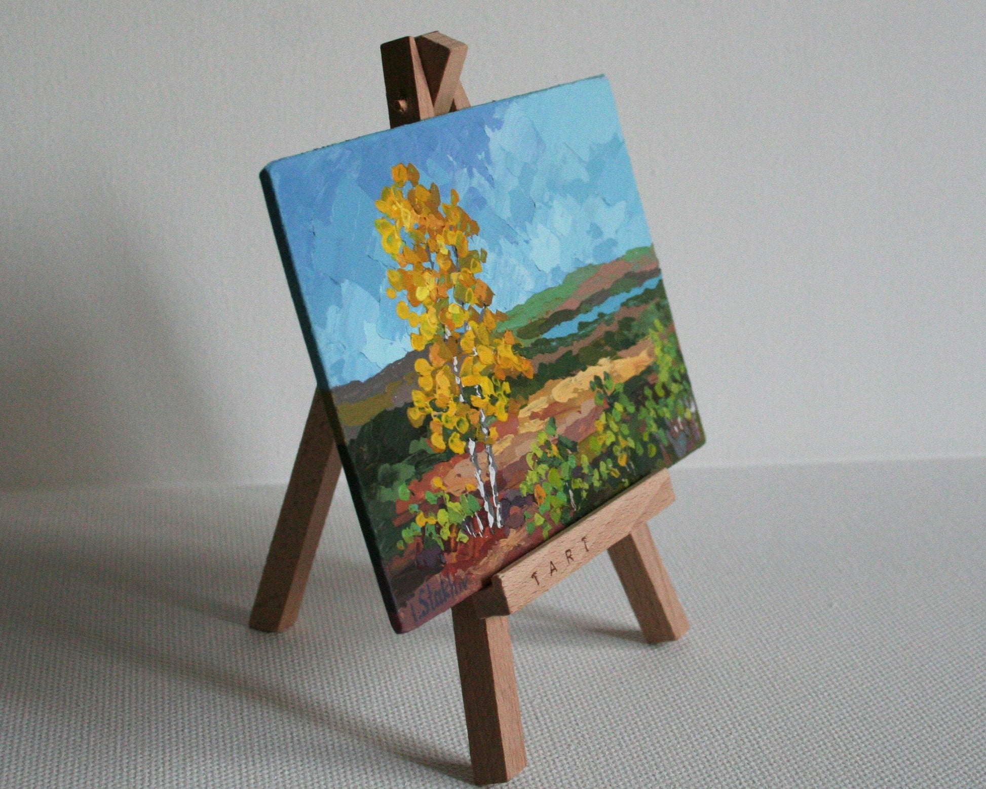 Miniature landscape painting on a small easel