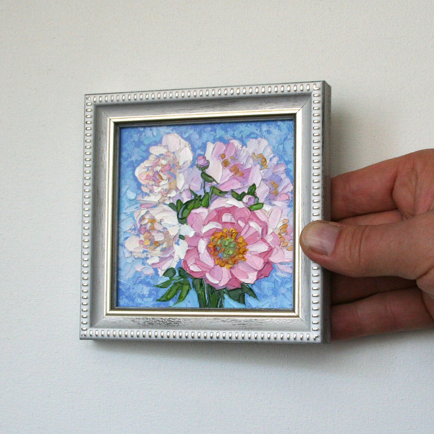 mini oil painting featuring vibrant pink peonies in bloom