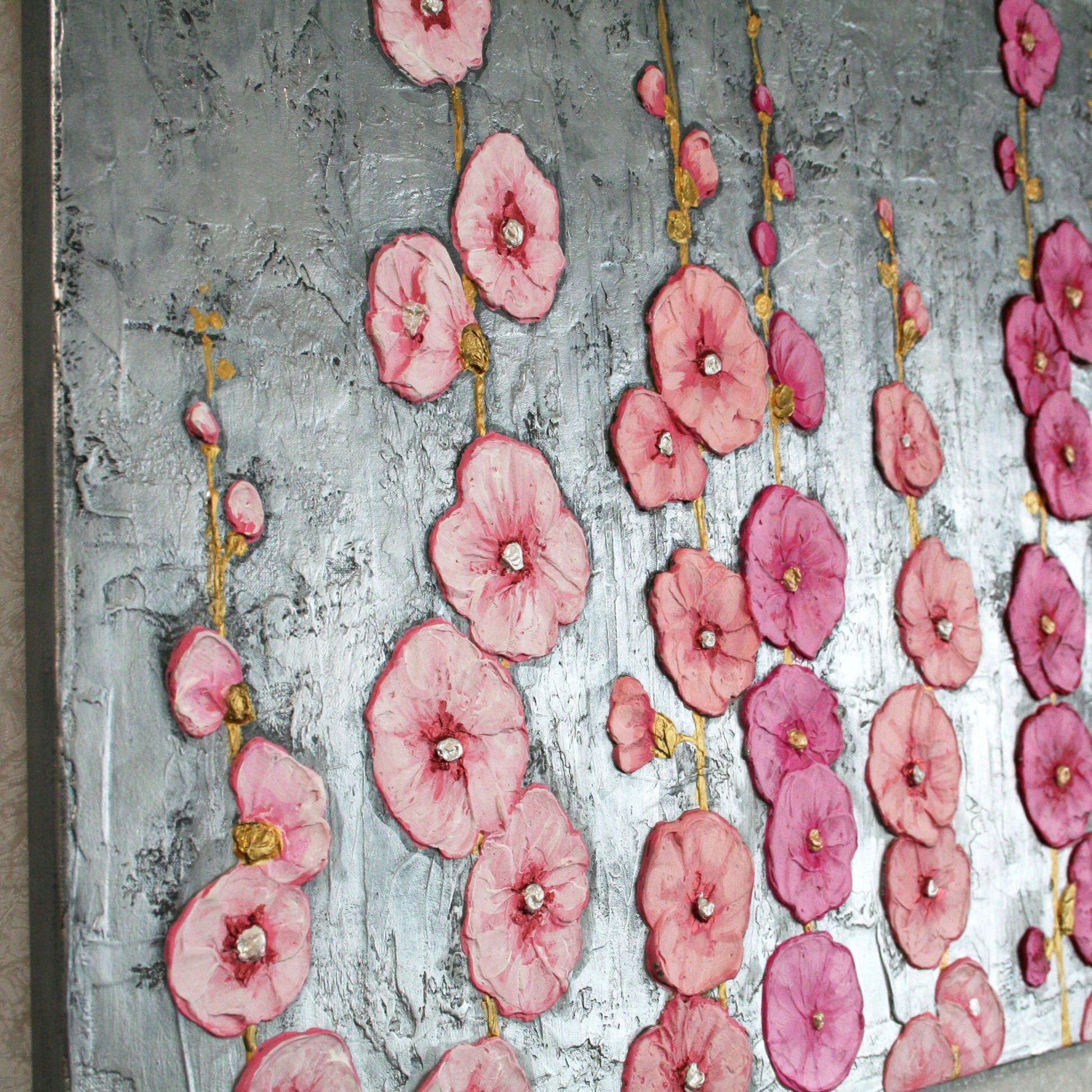 Macro shot of 3D sculptural floral texture on canvas, pink hollyhocks impasto art