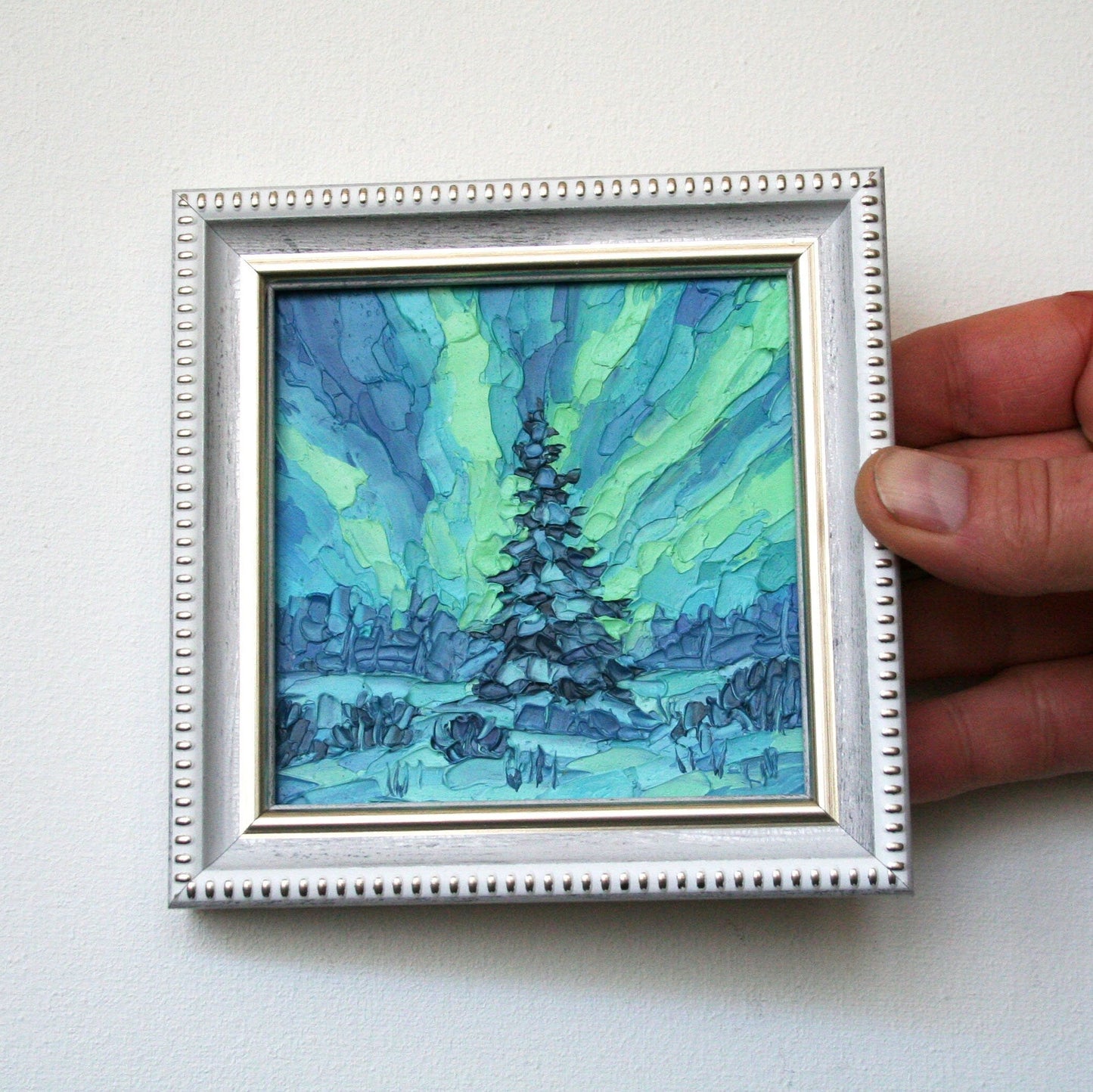 Northern Lights mini oil painting in white frame, Aurora Borealis night sky art by Iryna Stakhiv