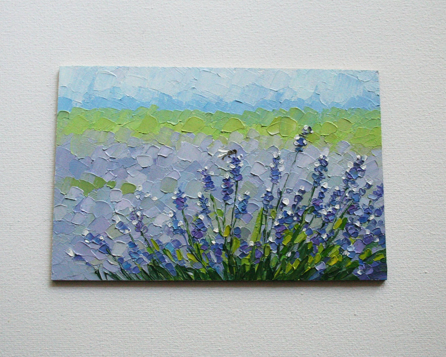 Palette knife textured oil painting detail, thick impasto paint strokes on lavender field