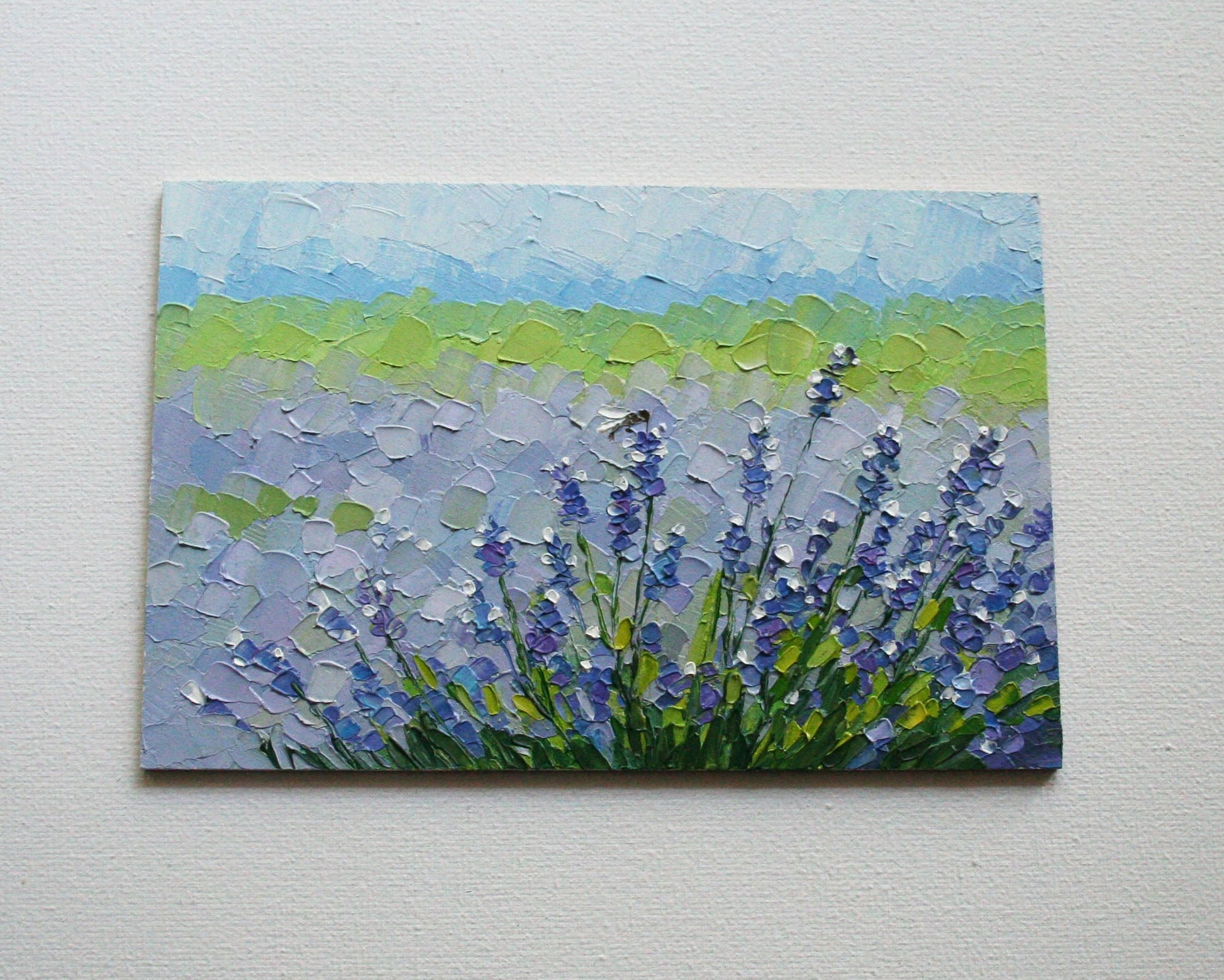 Palette knife textured oil painting detail, thick impasto paint strokes on lavender field