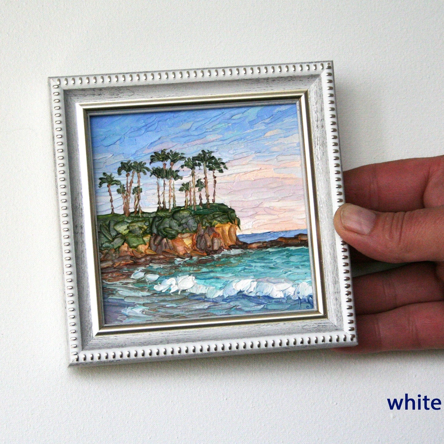 Rocky cliff with palm trees Laguna Beach oil painting, turquoise waves impasto texture palette knife