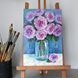 riginal rose oil painting on easel in artist studio, palette knife impasto pink roses in glass jar, 8x12