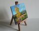 Miniature landscape painting on a small easel