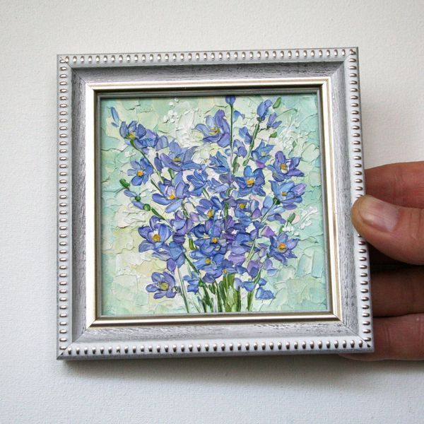 original mini painting of blue flowers in white frame, palette knife textured artwork